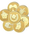 Collection of 7 gold coins for a fortune cookie